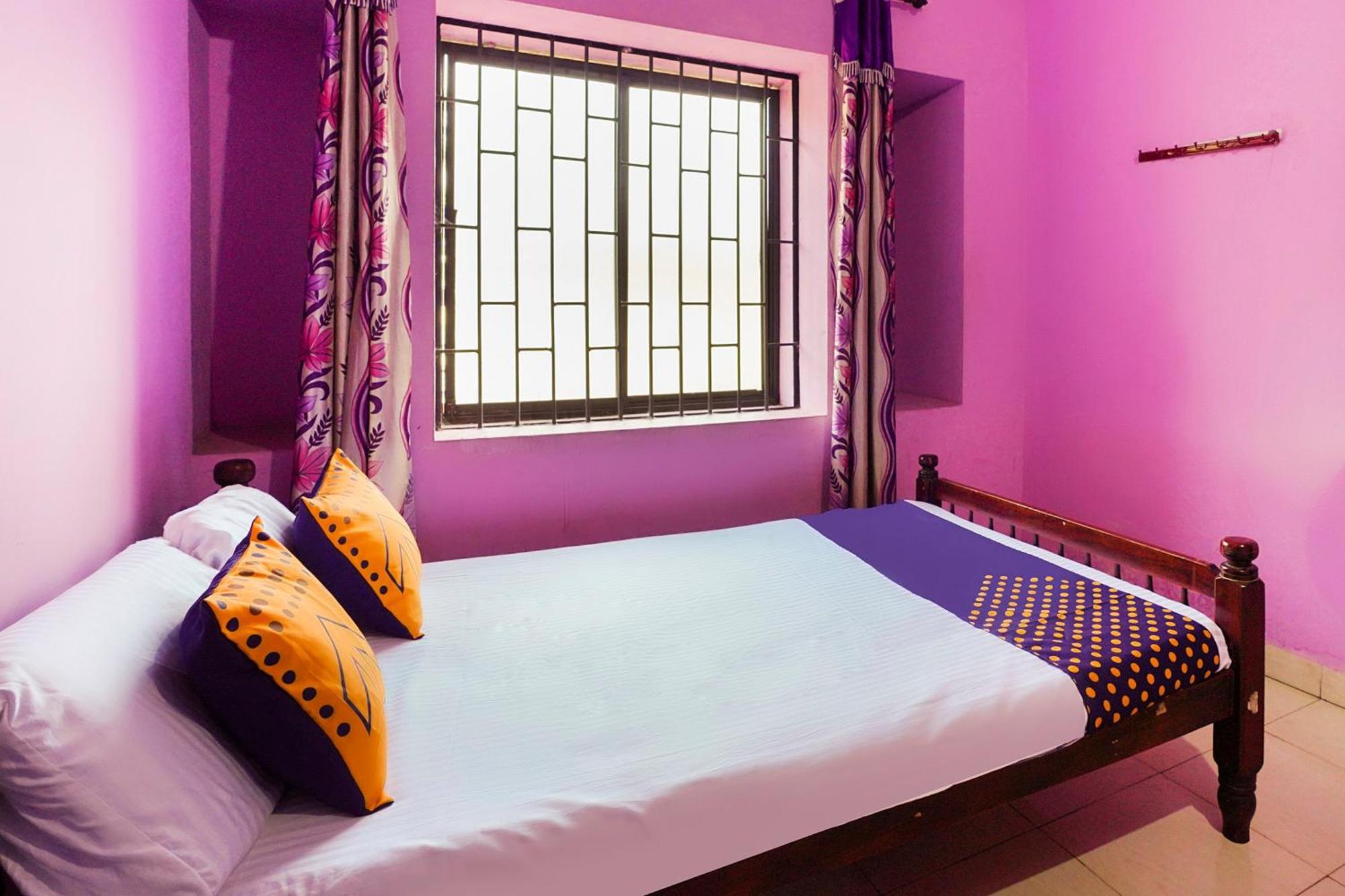 Hotel SPOT ON 66098 Rohini Residency Edayur Esterno foto