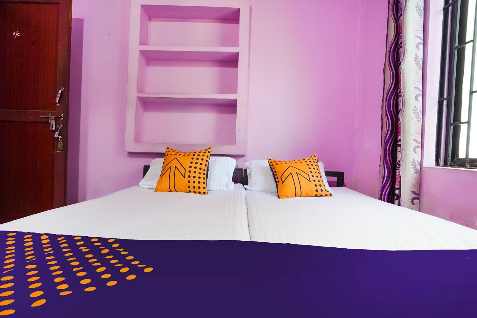 Hotel SPOT ON 66098 Rohini Residency Edayur Esterno foto